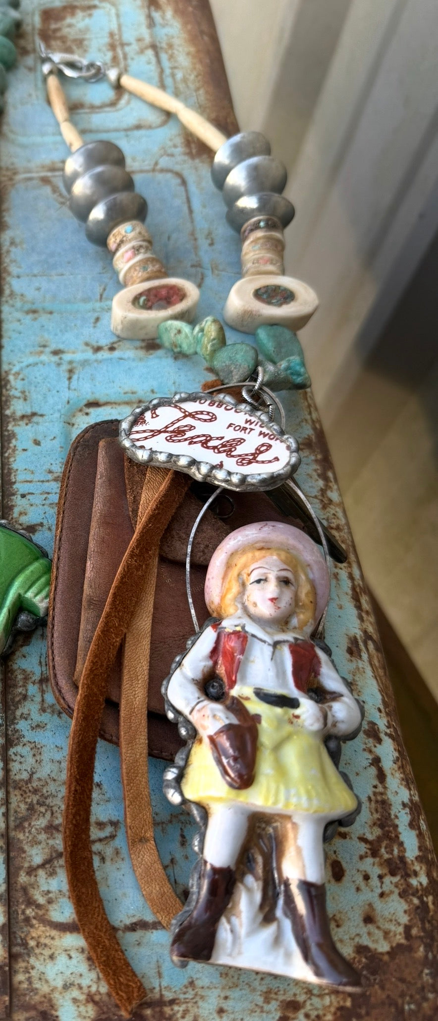Texas Cowgirl with vintage leather purse