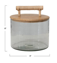 Load image into Gallery viewer, Glass Jar w/ Mango Wood Lid &amp; Rattan Wrapped Handle
